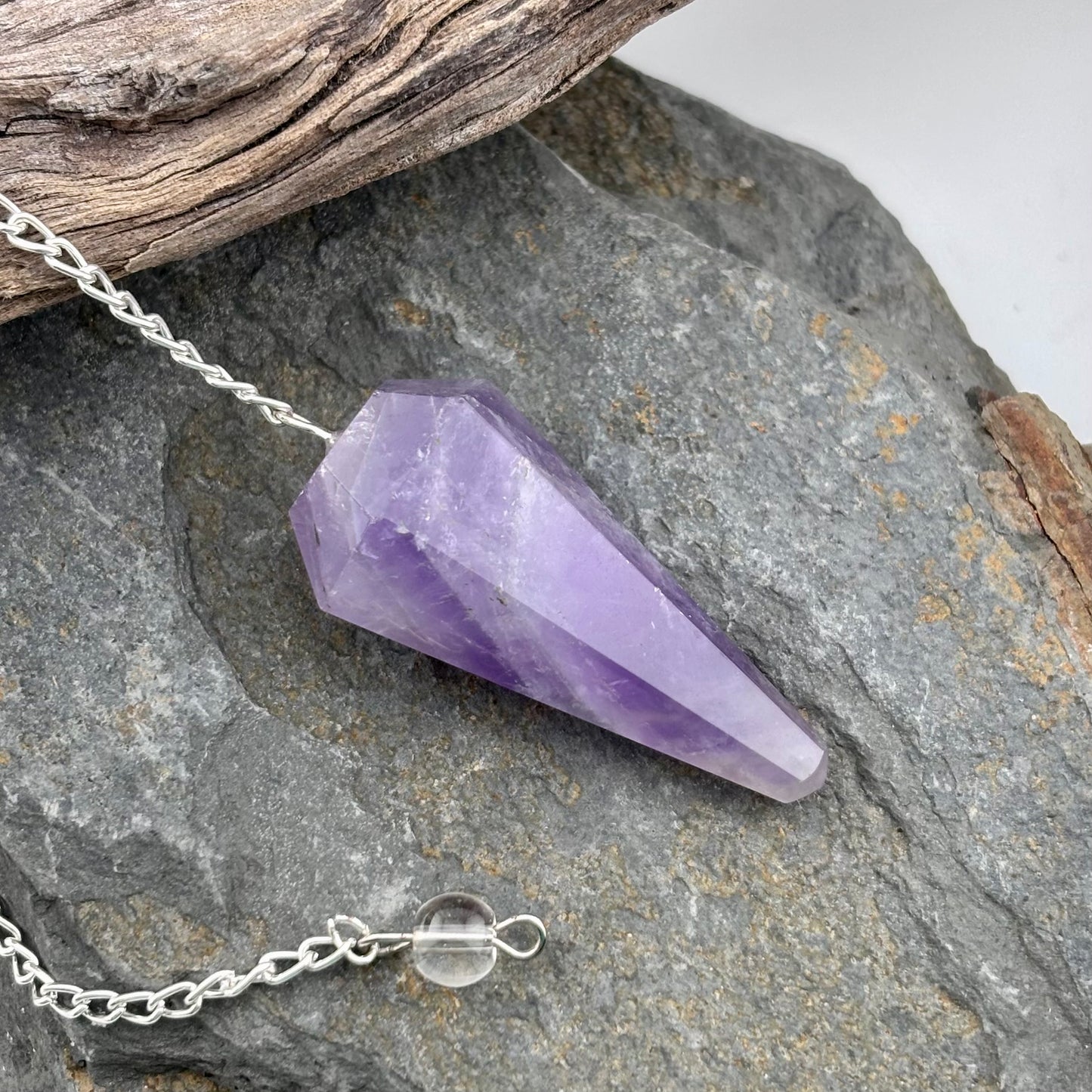 Amethyst crystal pendulum on a chain