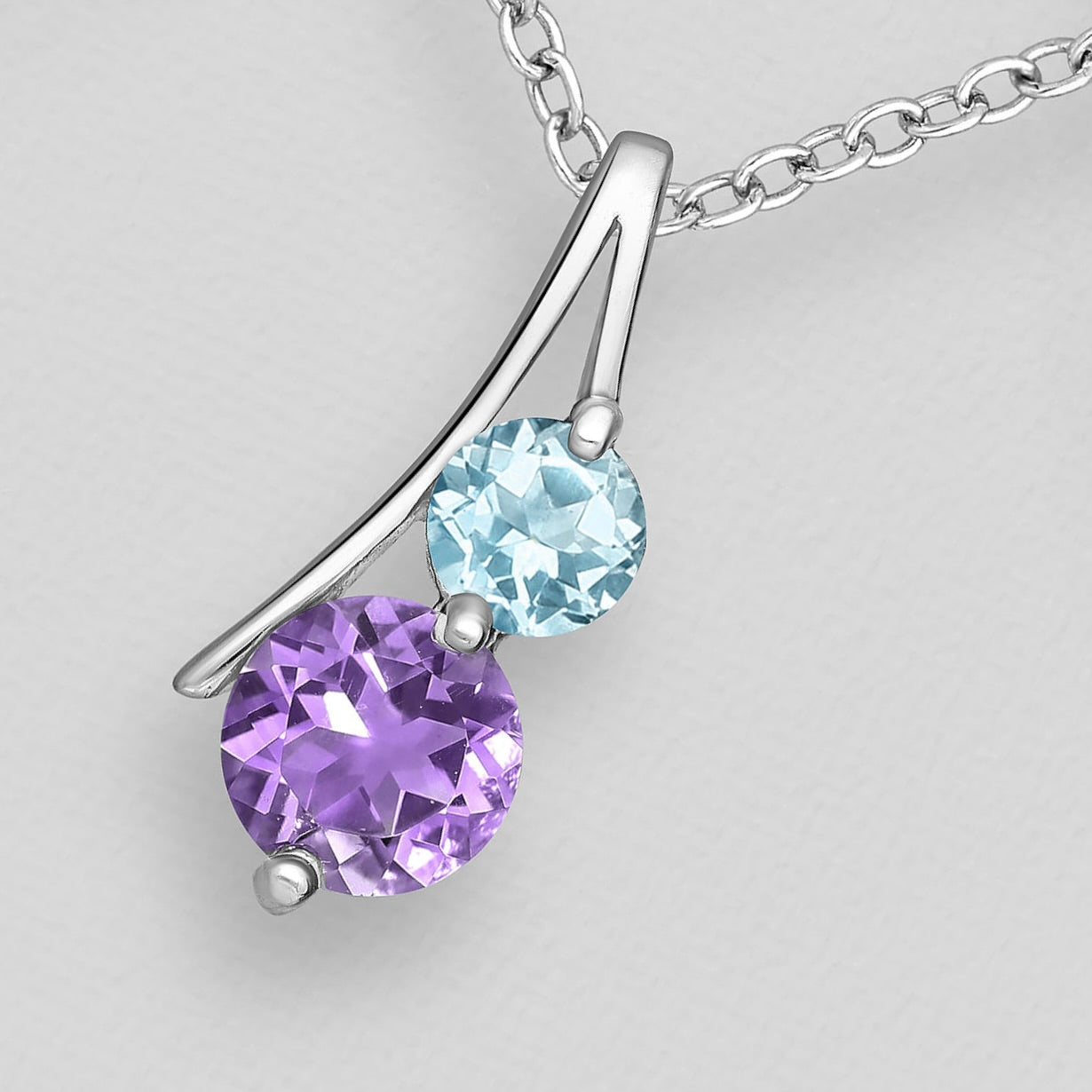amethyst and blue topaz facetted pendant 
