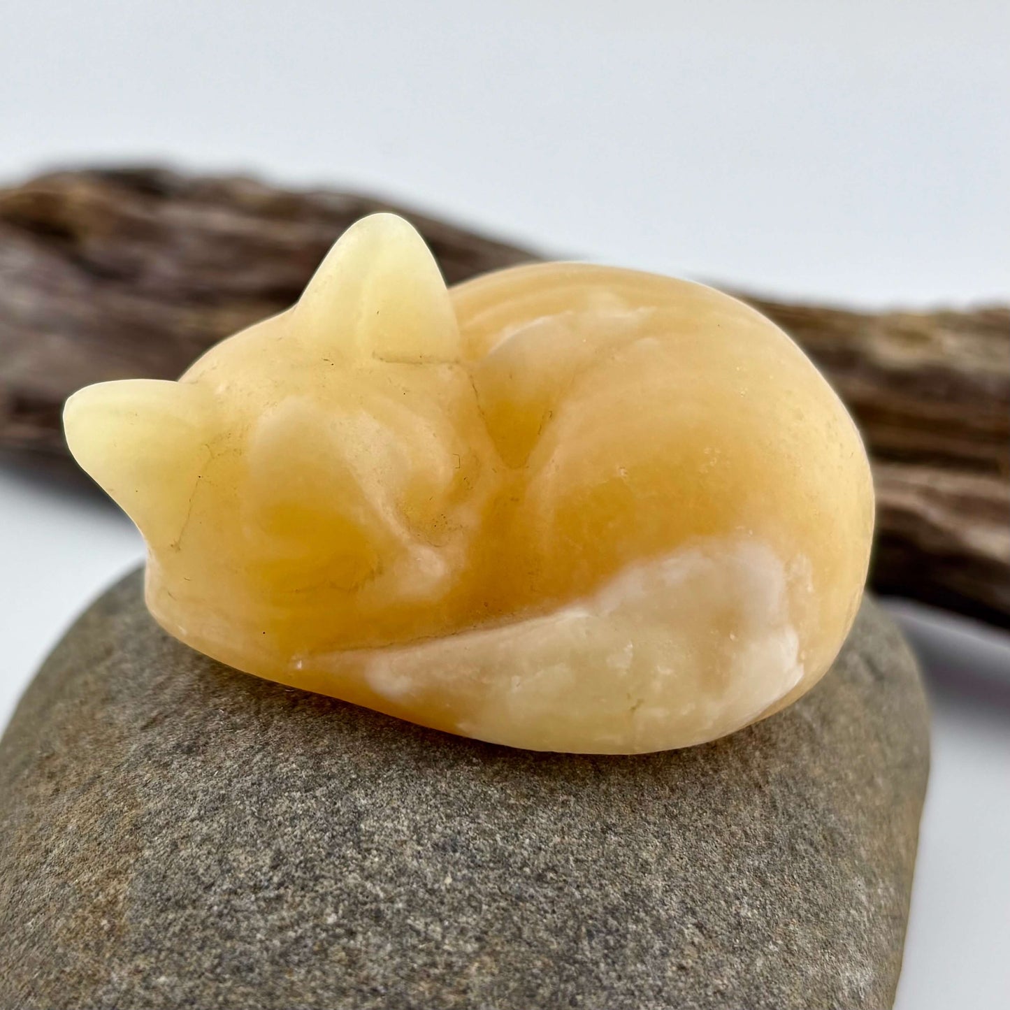 Yellow Calcite Carved Sleeping Cat - 102 grams / 5 cm