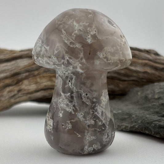 Decorative stone mushroom with a natural stone background