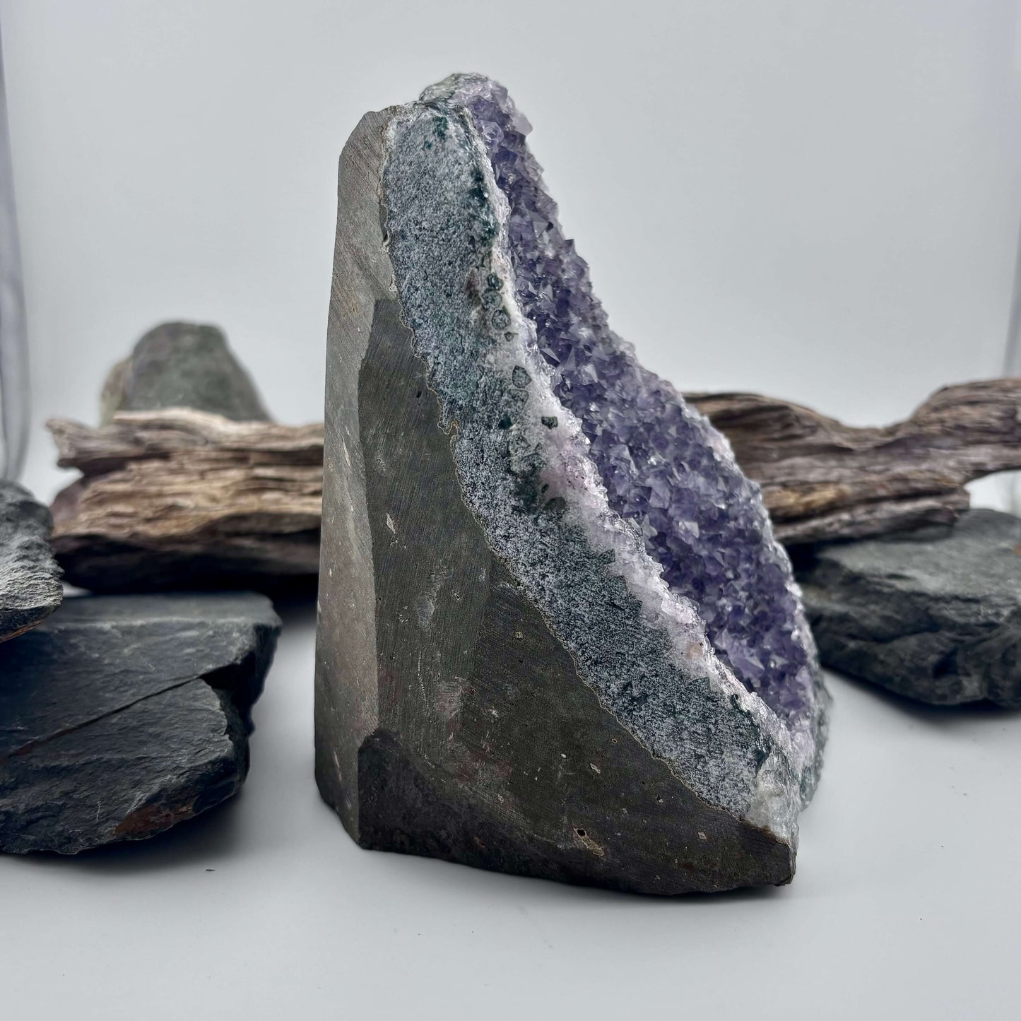 Amethyst crystal geode on a wooden surface 