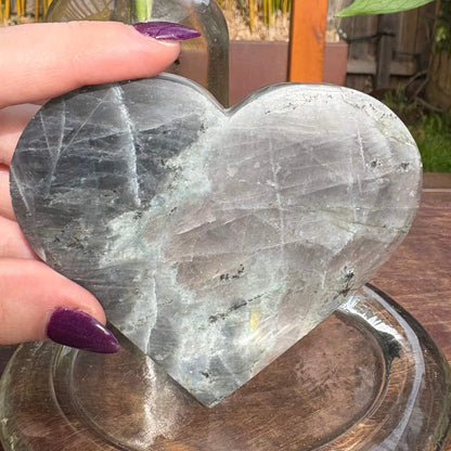 Labradorite Carved Heart  w black stand - 200 grams